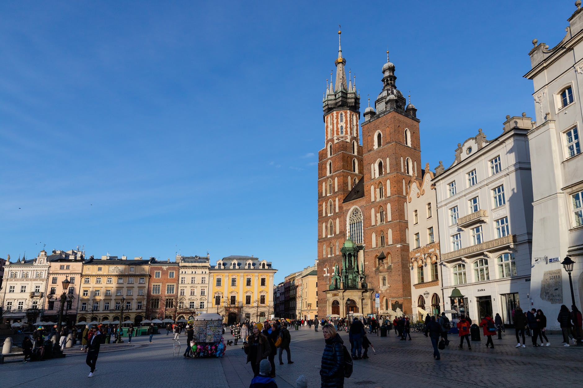 people at main market square in krakow poland